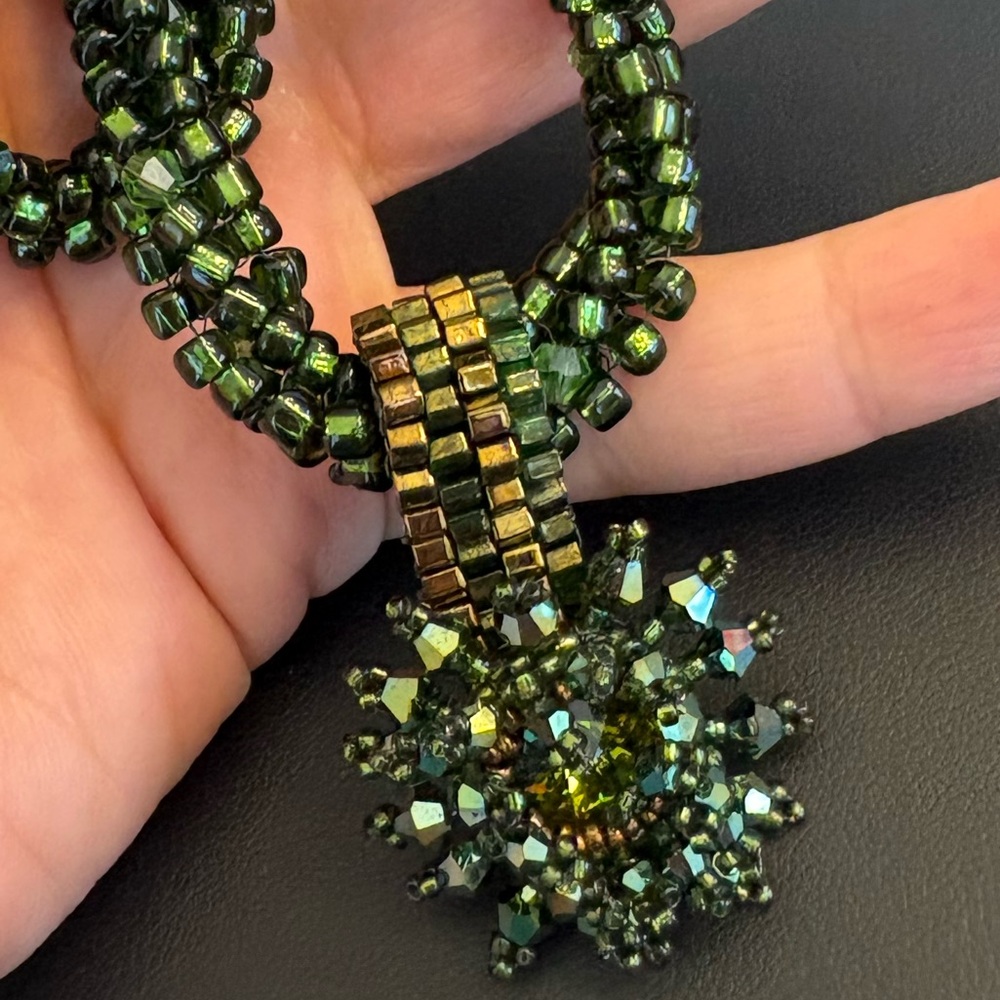 Multi stranded, crystal beaded necklace green butterfly clasp 22"